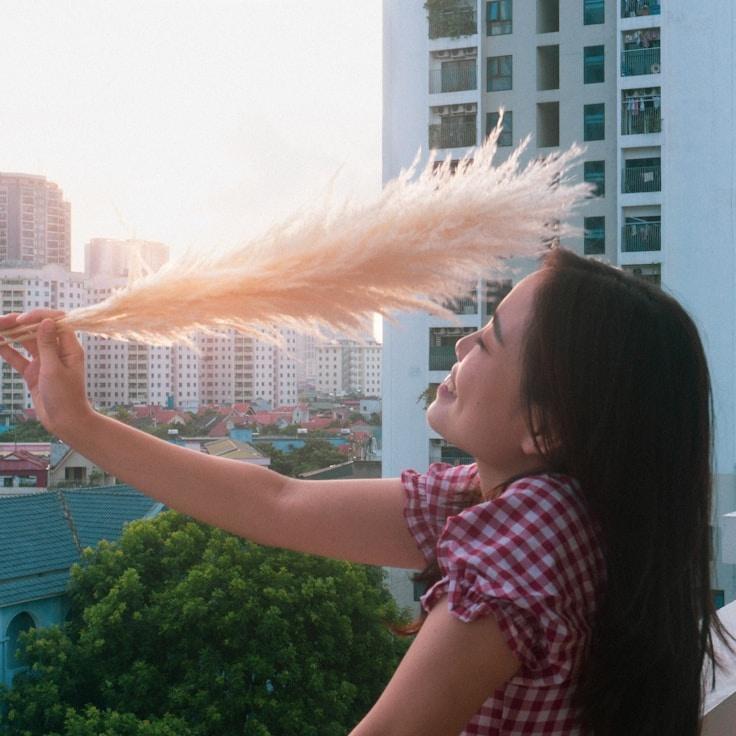 Portrait of Mira Chen, group coordinator and fusion cooking expert